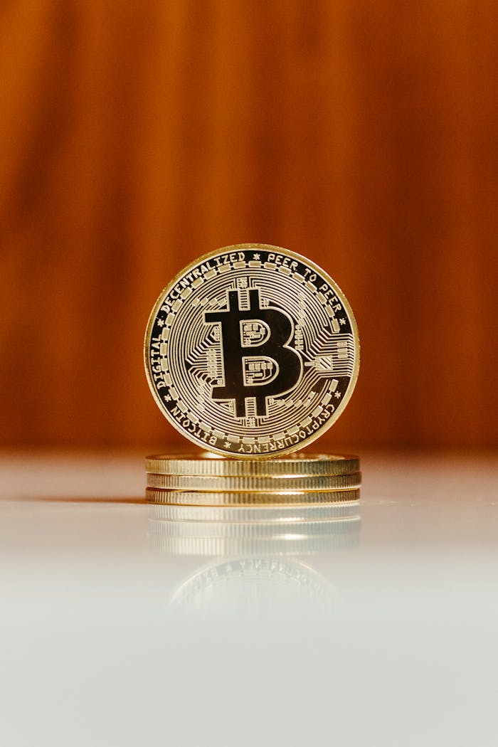 A focused shot of a Bitcoin coin stack showcasing its digital and financial significance.